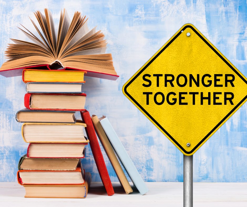 A yellow yield sign featuring the words "Stronger Together" posted near a stack of books. This image symbolizes how authors should help elevate each other because we share readers and encouraging the reading of books and keeping fans happy is always the first priority. Authors should not be bringing each other down.