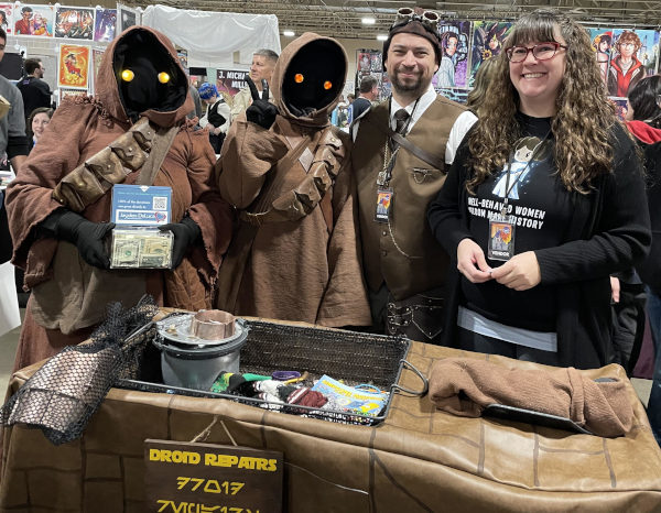 Sci-fi author J. L. Stowers with Jawas from the Star Wars franchise at 2024 Gem State Comic Con